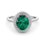 Double Halo emerald-diamond ring