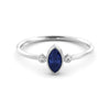 A delicate marquise sapphire ring and a pair of diamonds