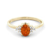 A fine orange sapphire and diamond ring