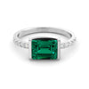 1.45 carat emerald ring and ten diamonds