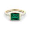 1.45 carat emerald ring and ten diamonds